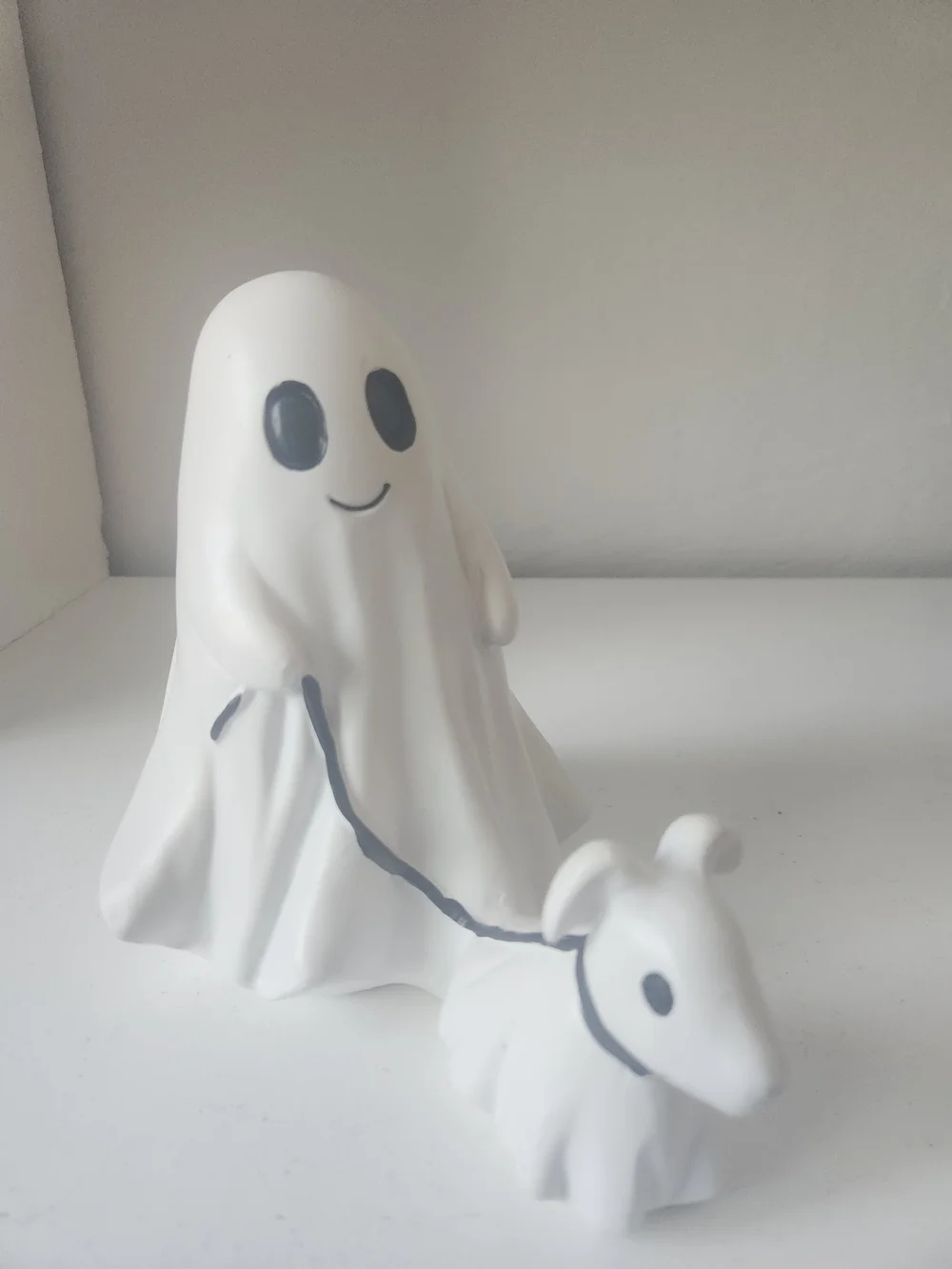 White Resin Ghost Figurine Walking A Ghosr Dog